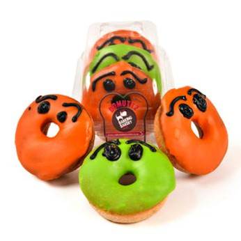 Barking Bakery Howloween Domuttz pack of handmade dog treats in orange and green.