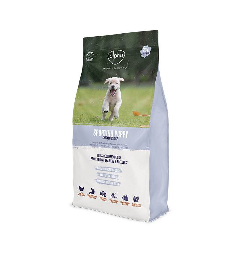 Alpha Sporting Puppy Dry Dog Food packaging with a happy puppy running on the front label.